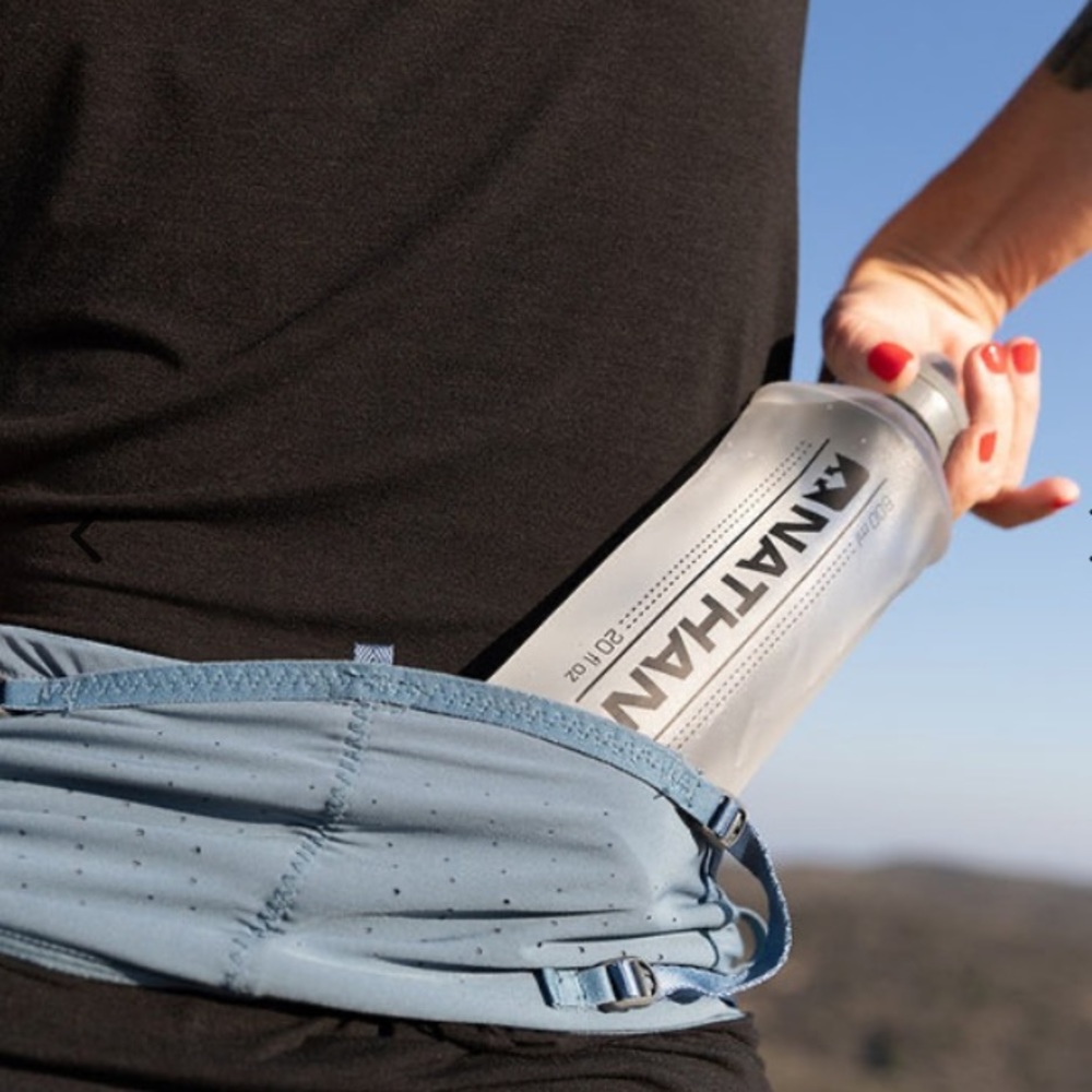Nathan female hydration running belt.